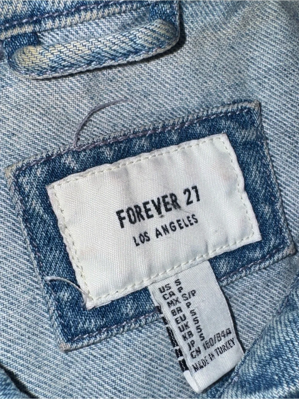 Forever 21 womens denim jacket sz. small light wash trucker Trench Coat distress